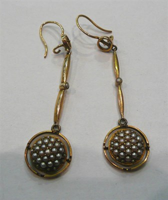 Lot 468 - A pair of early 20th century seed pearl set drop earrings