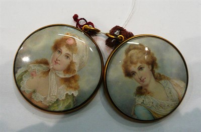 Lot 474 - A pair of portrait miniatures of young ladies