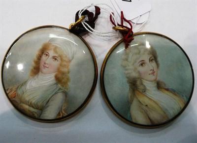 Lot 475 - A pair of portrait miniatures of young ladies