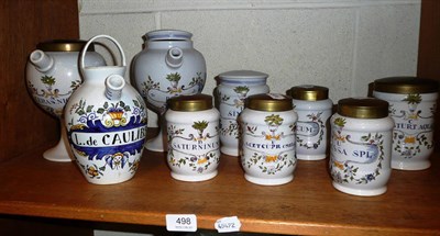 Lot 498 - Six various drug jars, a Maiollica jug and two earns