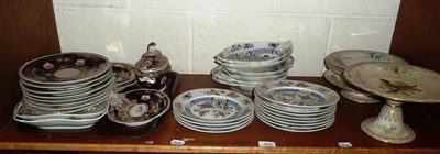 Lot 503 - A shelf of 19th century English ceramics including blue and gilt decorated plates, a Spode part...