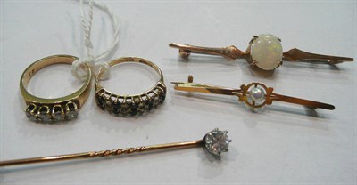 Lot 504 - A 9ct gold sapphire two row ring, a dress ring stamped '9ct', a button pearl set bar brooch (a.f.)