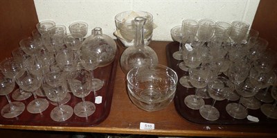 Lot 510 - A suite of engraved drinking glasses, matching rinses and decanter