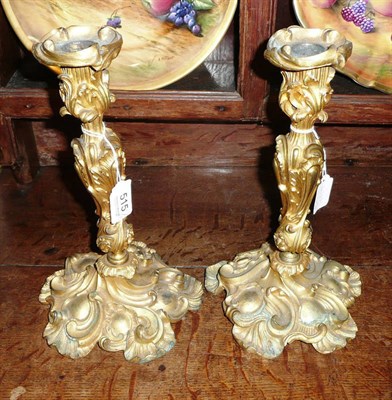 Lot 515 - An ornamental pair of candlesticks