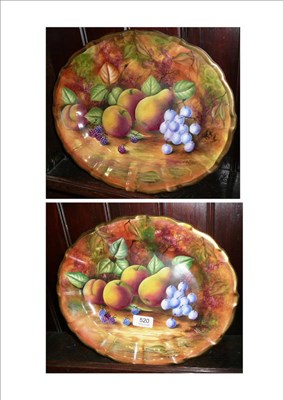 Lot 520 - A Baroness fine china pair of platters, painted by J.Mattram, 32cm wide