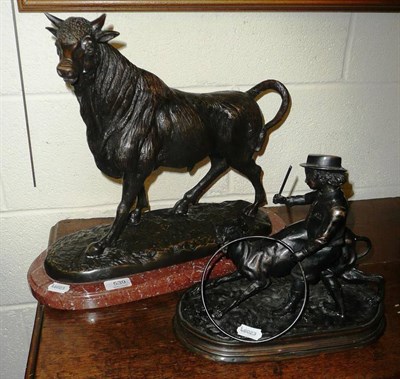 Lot 539 - A reproduction bronze figure of a bull on a marble base, together with a bronze figure of a man and