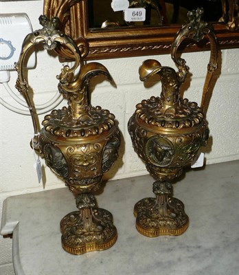 Lot 550 - A pair of gilt bronze Renaissance-style ewers, 19th century, of baluster form with arched...