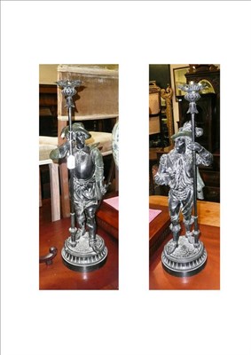 Lot 556 - Pair of 19th century spelter figures of knights as table lamps