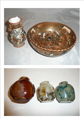 Lot 557 - A small Satsumaware vase, a Satsumaware bowl and three glass snuff bottles