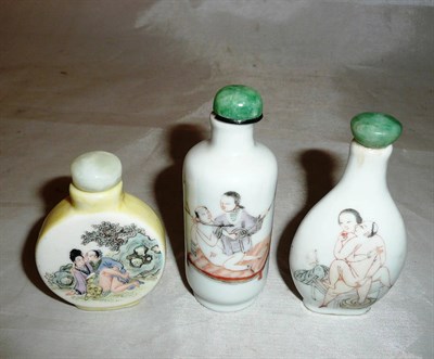 Lot 560 - Three Chinese painted porcelain snuff bottles, 19th/20th century, painted with an erotic scene