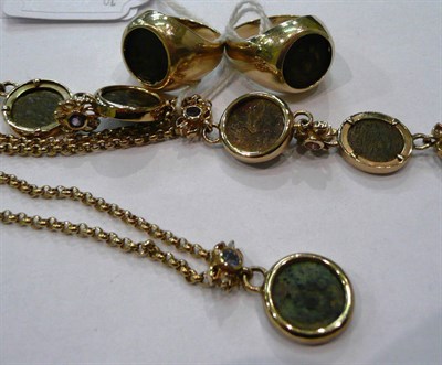 Lot 570 - Two 9ct gold coin-set rings, a 9ct gold coin and amethyst-set bracelet and a matching pendant...