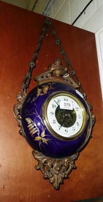 Lot 579 - Victorian ceramic clock with metal fittings and chain