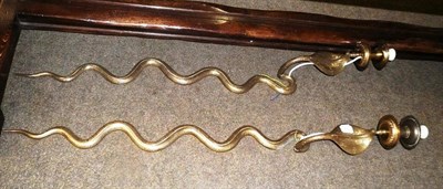 Lot 612 - Pair of brass engraved snake wall lights