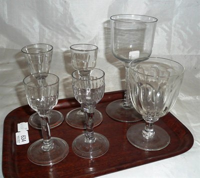 Lot 634 - Six wine glasses including a large example with air twist stem