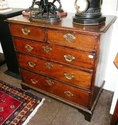 Lot 643 - An 18th century oak straight fronted chest of drawers