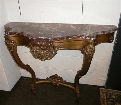 Lot 651 - French giltwood red marble console table