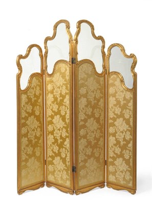 Lot 656 - A four fold giltwood dressing screen