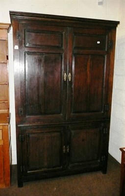 Lot 657 - An 18th century oak press cupboard