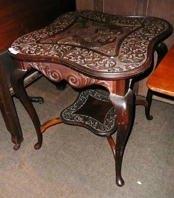 Lot 676 - Arts & Crafts dolphin centre table