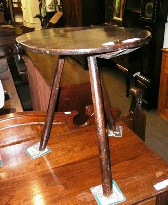 Lot 679 - A small tripod wine table