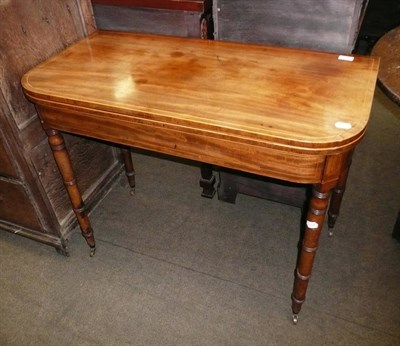 Lot 689 - Regency mahogany and inlaid folding tea table on ring turned legs