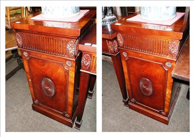 Lot 698 - Pair of Adams style carved mahogany cabinets