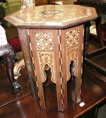 Lot 713 - An Eastern mother of pearl inlaid octagonal top table