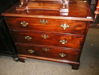 Lot 719 - A Georgian mahogany three drawer chest (a.f.)