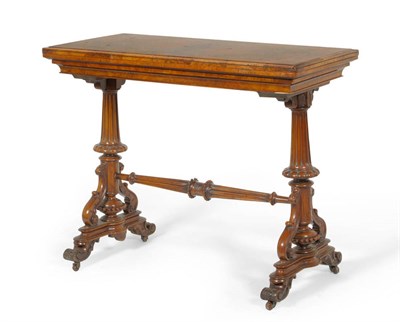 Lot 730 - An early Victorian figured walnut card table with inlaid top and fluted supports