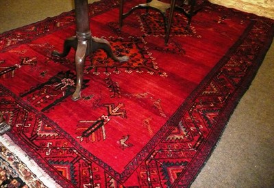 Lot 731 - Afshar Carpet, South East Persia The crimson field with two linked stepped medallions flanked...