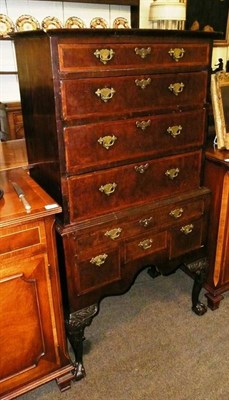 Lot 743 - Walnut chest on stand