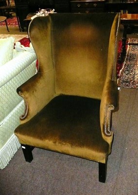 Lot 746 - Wing back armchair