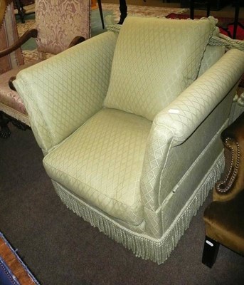 Lot 747 - A modern green upholstered armchair