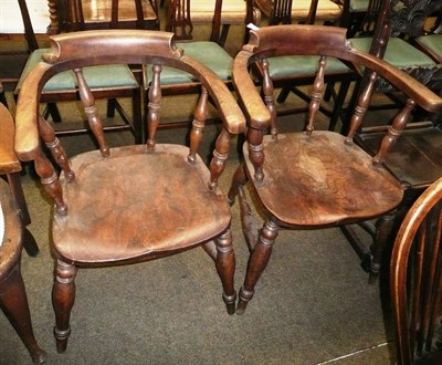 Lot 767 - Two elm smoker's bow chairs * Provenance: Sedburgh School, possibly purchased in the 70's