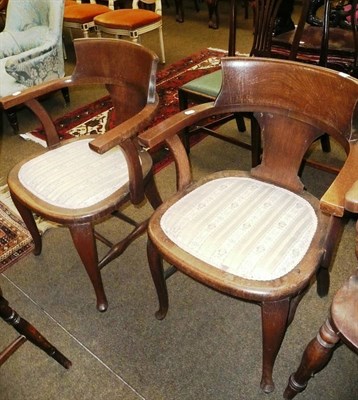 Lot 768 - Pair of Edwardian oak armchairs