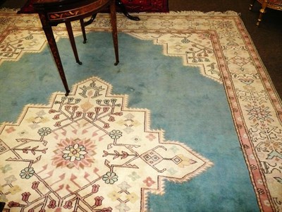 Lot 787 - An 'Ushak' Carpet Central Anatolia The plain  aquamarine field with central stepped medallion...