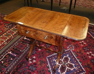 Lot 790 - A George IV yew wood twin-flap sewing or work table, with narrow dentil stringing single drawer, on