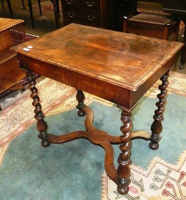 Lot 792 - Walnut side table in a 17th century style with wavy shaped stretcher