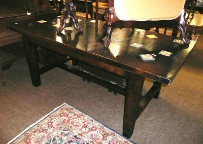 Lot 819 - Reproduction oak plank top dining table (6ft by 3ft)