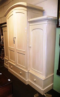 Lot 827 - Large cream painted pine triple wardrobe