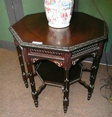 Lot 836 - Mahogany octagonal centre table with triple cluster legs