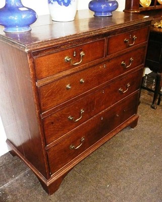 Lot 851 - George III oak straight fronted chest of drawers