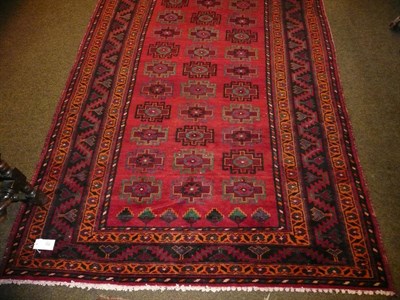 Lot 853 - Kurdish Carpet, Persian Kurdistan The rust field with rows of Memling guls enclosed by borders...