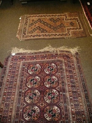 Lot 854 - Tekke Rug North West Afghanistan The field with rows of quartered guls enclosed by multiple...