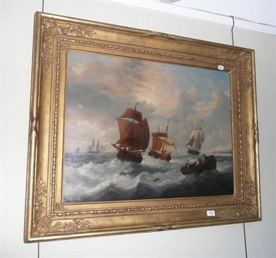 Lot 906 - English school (19th century) sailing boats in a rough sea off a coastline, oil on canvas in a gilt