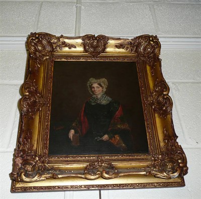 Lot 943 - Oil painting, portrait of a lady holding spectacles and a book