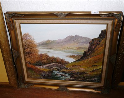 Lot 1026 - A framed oil painting of a lakeland scene