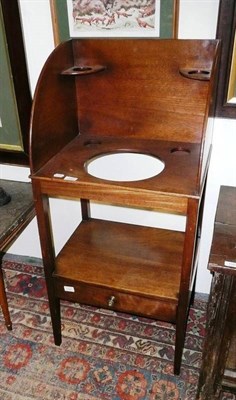 Lot 1057 - Late George III mahogany washstand