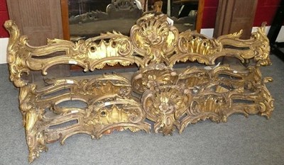 Lot 1074 - Three George III style gilt and gesso pelmets