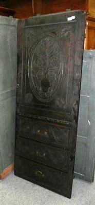 Lot 1077 - A green painted part wardrobe with carved doors